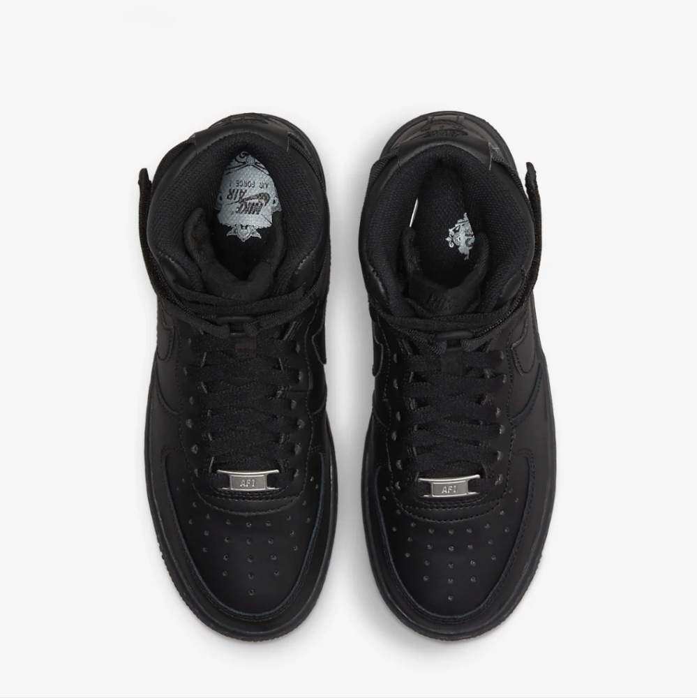 Nike Air Force 1 high tops, size 6 big kids, solid black.
